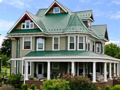 white house green metal roof|metal roof house color combinations.